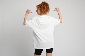 Redhead adult woman backwards in t-shirt mockup