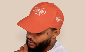 Young tattooed man dad hat mockup | Start Editing Online