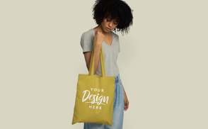 Black woman with tote bag mockup