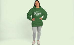 Young woman standing in hoodie mockup