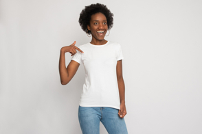 Black woman pointing her t-shirt mockup