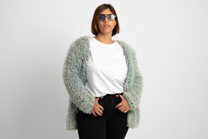 Plus size woman in faux fur coat and t-shirt mockup