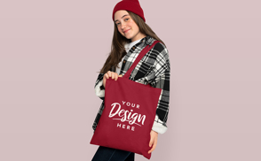 Teen girl with beanie and tote bag mockup