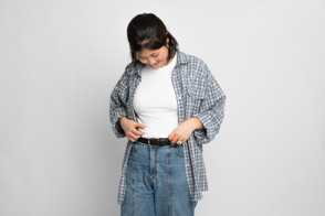 Asian girl wearing checkered shirt and t-shirt mockup