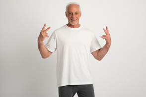 Senior male doing hand gestures in t-shirt mockup