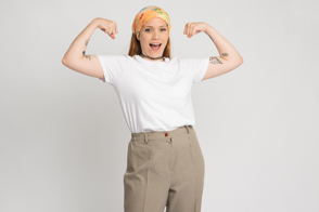 Strong hispanic girl with bandana in t-shirt mockup