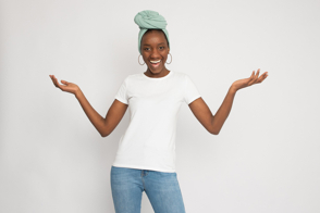 Black woman with open arms in t-shirt mockup