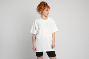 Redhead female with black shorts and t-shirt mockup
