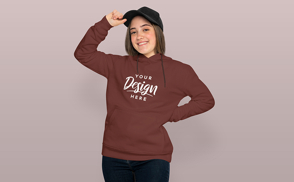 Happy teen girl in hat and hoodie mockup