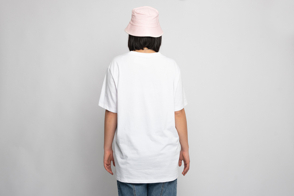 Asian woman backwards with hat and t-shirt mockup