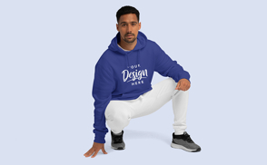 Latin american man crouch in hoodie mockup