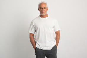 Senior man with hands in pockets and t-shirt mockup