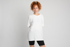 Redhead woman with black shorts and t-shirt mockup
