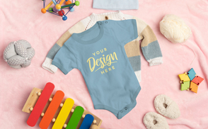 Cute baby onesie with toys mockup