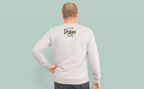 Man posing backwards in sweatshirt mockup