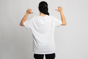 Latin american girl backwards in cargo pants and t-shirt mockup