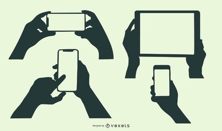 Silhouette Hands Holding Mobile Devices Set