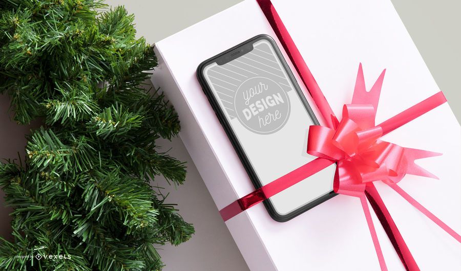 Maqueta de smartphone de regalo de navidad Maqueta de smartphone de regalo de navidad