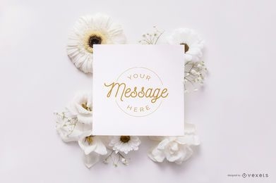 Card over white flowers mockup