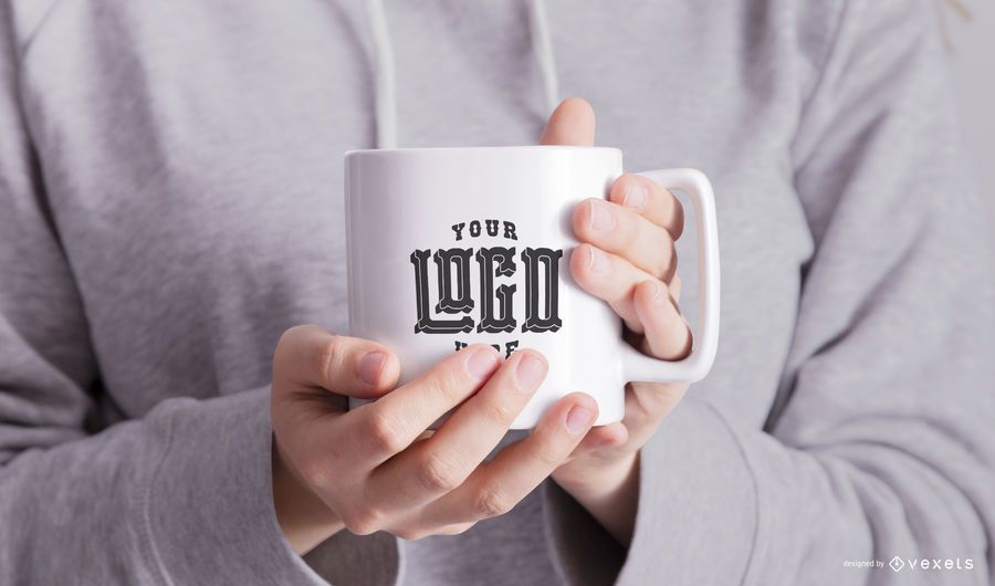 Mãos segurando uma maquete de caneca Mãos segurando uma maquete de caneca