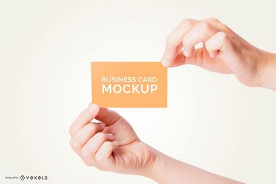 Hands holding business card mockup