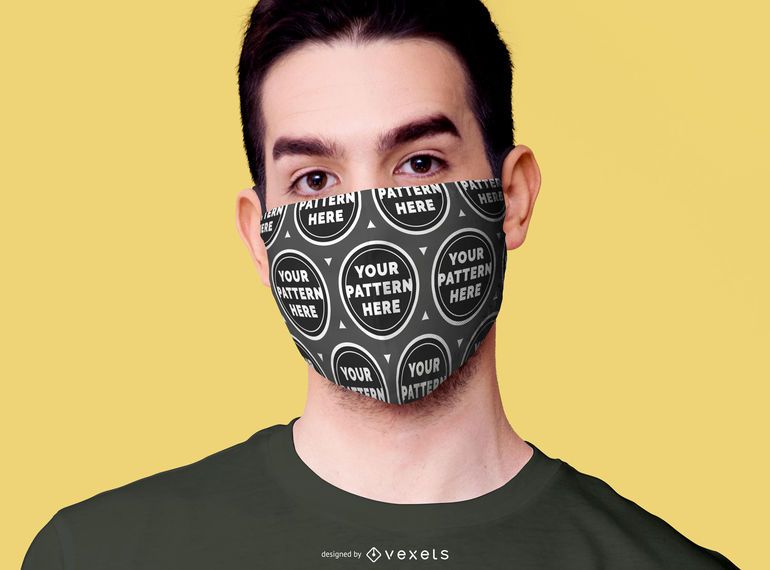 Männliches Modell, das Gesichtsmaskenmodell trägt Männliches Modell, das Gesichtsmaskenmodell trägt