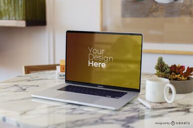 Laptop Macbook em maquete de mesa de mármore
