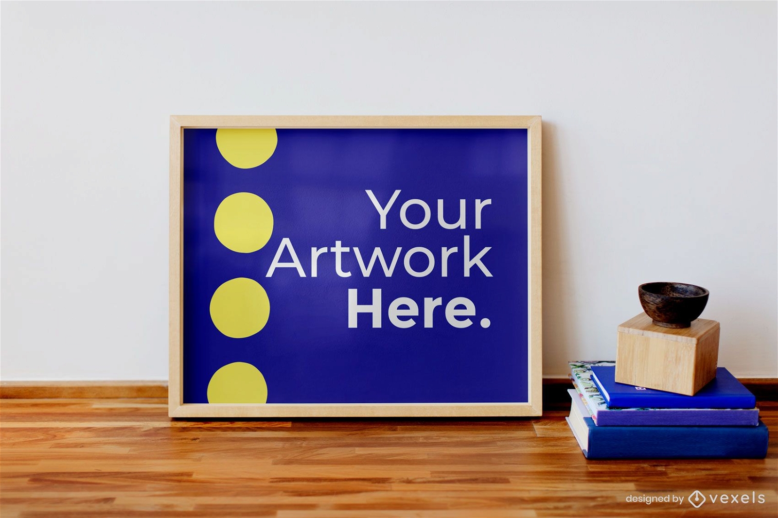 Artwork frame on table with books mockup