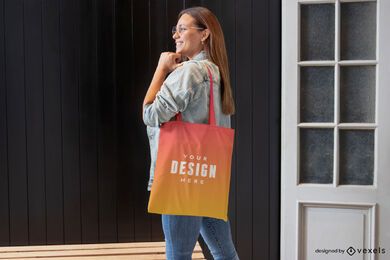 Woman in jean jacket tote bag mockup Woman in jean jacket tote bag mockup