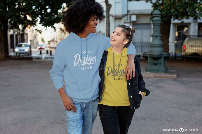 Happy couple laughing city hoodie mockup Happy couple laughing city hoodie mockup
