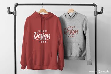 Dos sudaderas con capucha en maqueta de rack negro