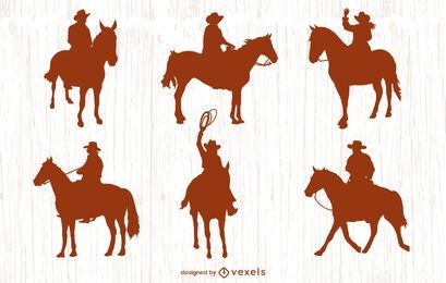 Standing cowboys silhouettes set