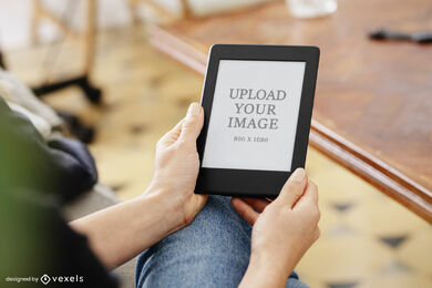 Hands holding kindle mockup