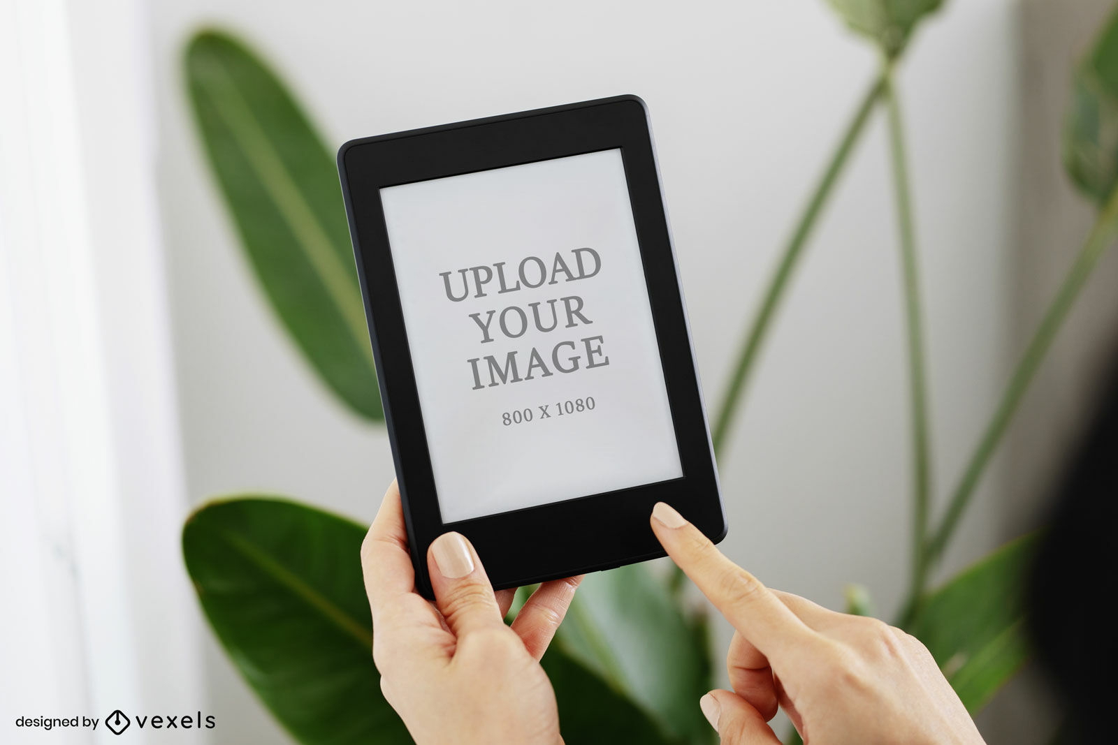 Maquete de mãos e plantas do Kindle