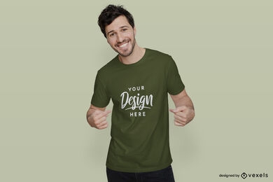 Hombre de maqueta de camiseta verde sonriendo fondo plano