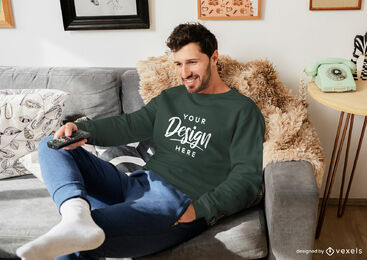 Green sweatshirt mockup man in living room sitting