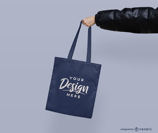 Hand Holding Blue Tote Bag Mockup Flat Background PSD Editable Template