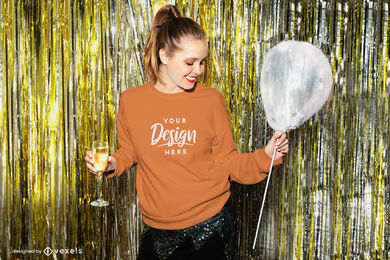 Chica sudadera naranja en maqueta de fiesta