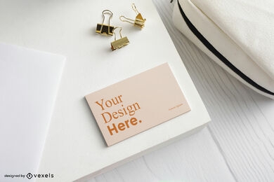 Orange business card mockup in white desk