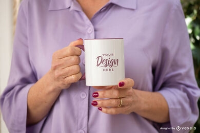 Woman holding white and purple mug mockup