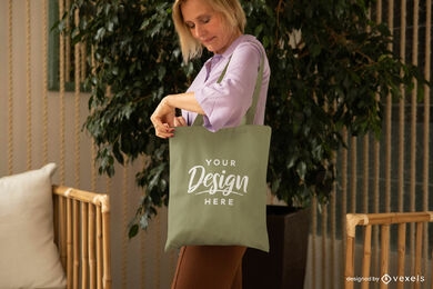 Woman mockup of green tote bag