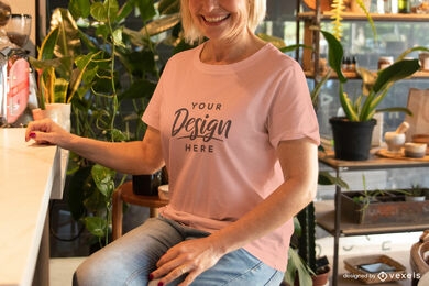 Woman mockup with pink t-shirt sitting