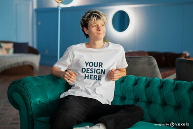 Blonde man sitting on couch t-shirt mockup