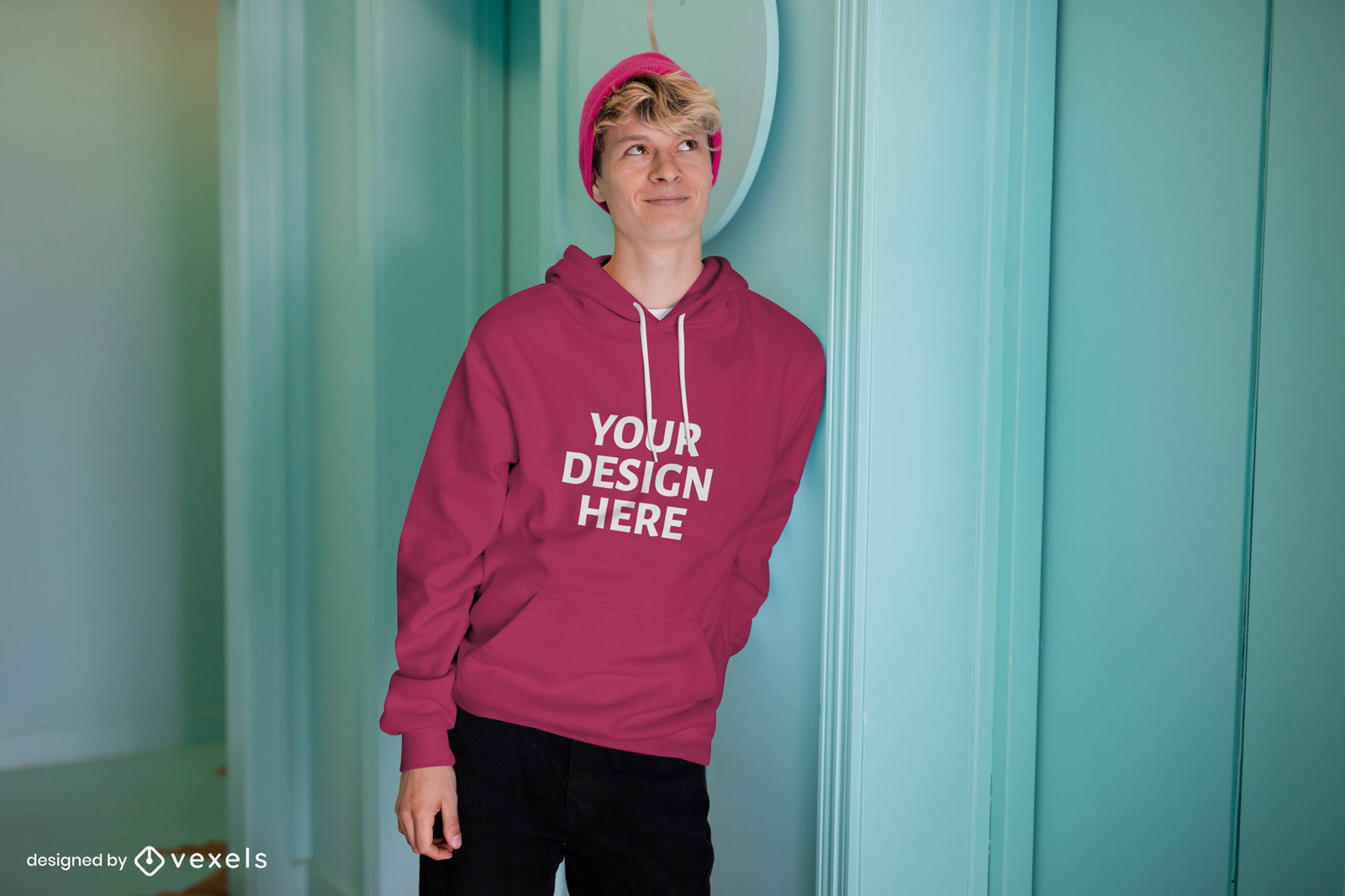 Man with hat on blue background hoodie mockup