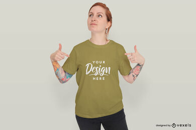 Red head woman pointing at t-shirt mockup