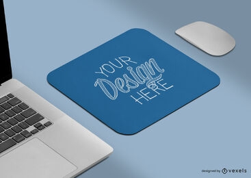 Mousepad on desk with laptop mockup