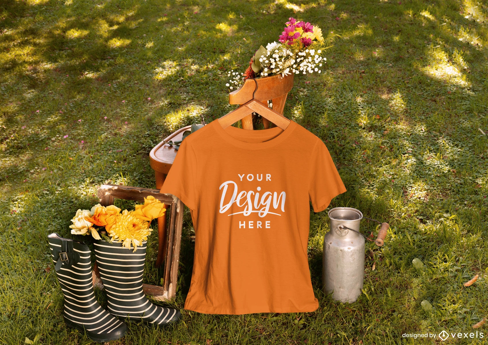 Jardim com maquete de camiseta de roupas e flores