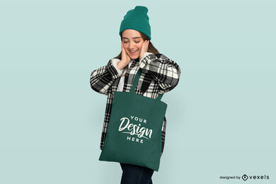 Girl looking at her tote bag mockup