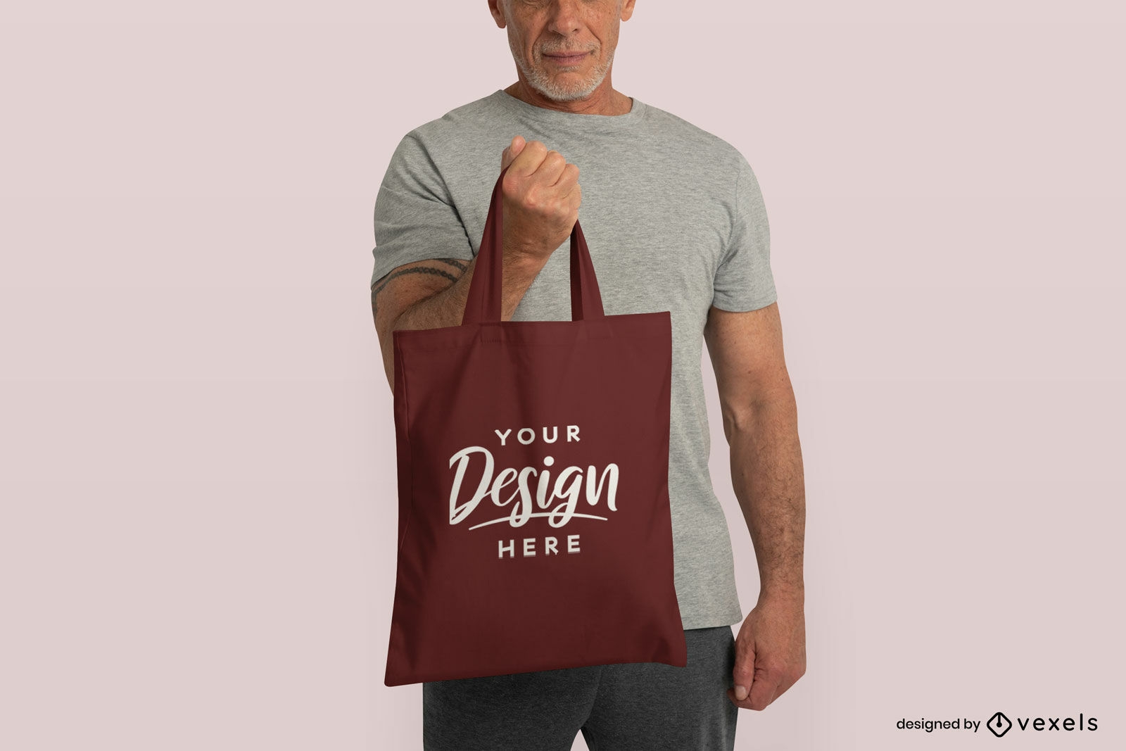 Older man model holding tote bag mockup