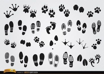 Silhuetas de pegadas de humanos e animais